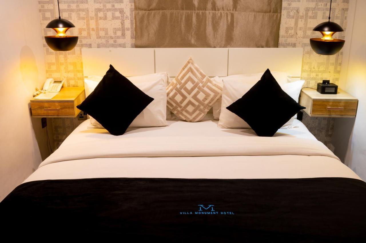 Villa Monument Hotel Aliayabiagba Buitenkant foto